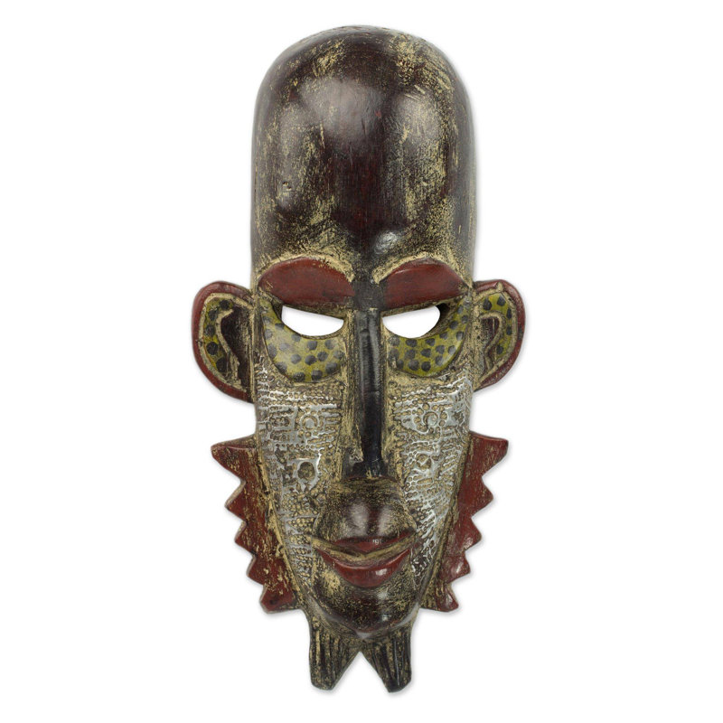 Masque de bois africain Bungalow Rose Wambi beckons
