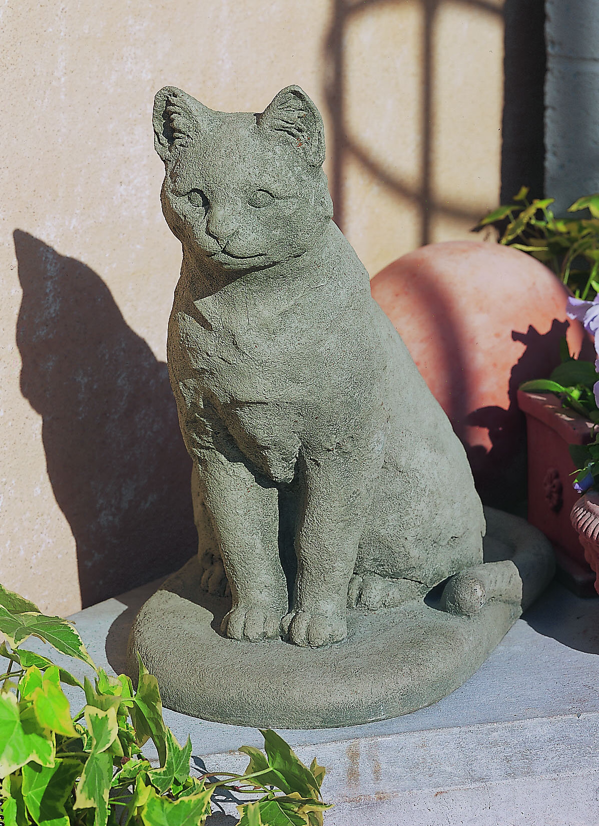 https://assets.wfcdn.com/im/01818551/compr-r85/1467/14677662/garden-cat-statue.jpg