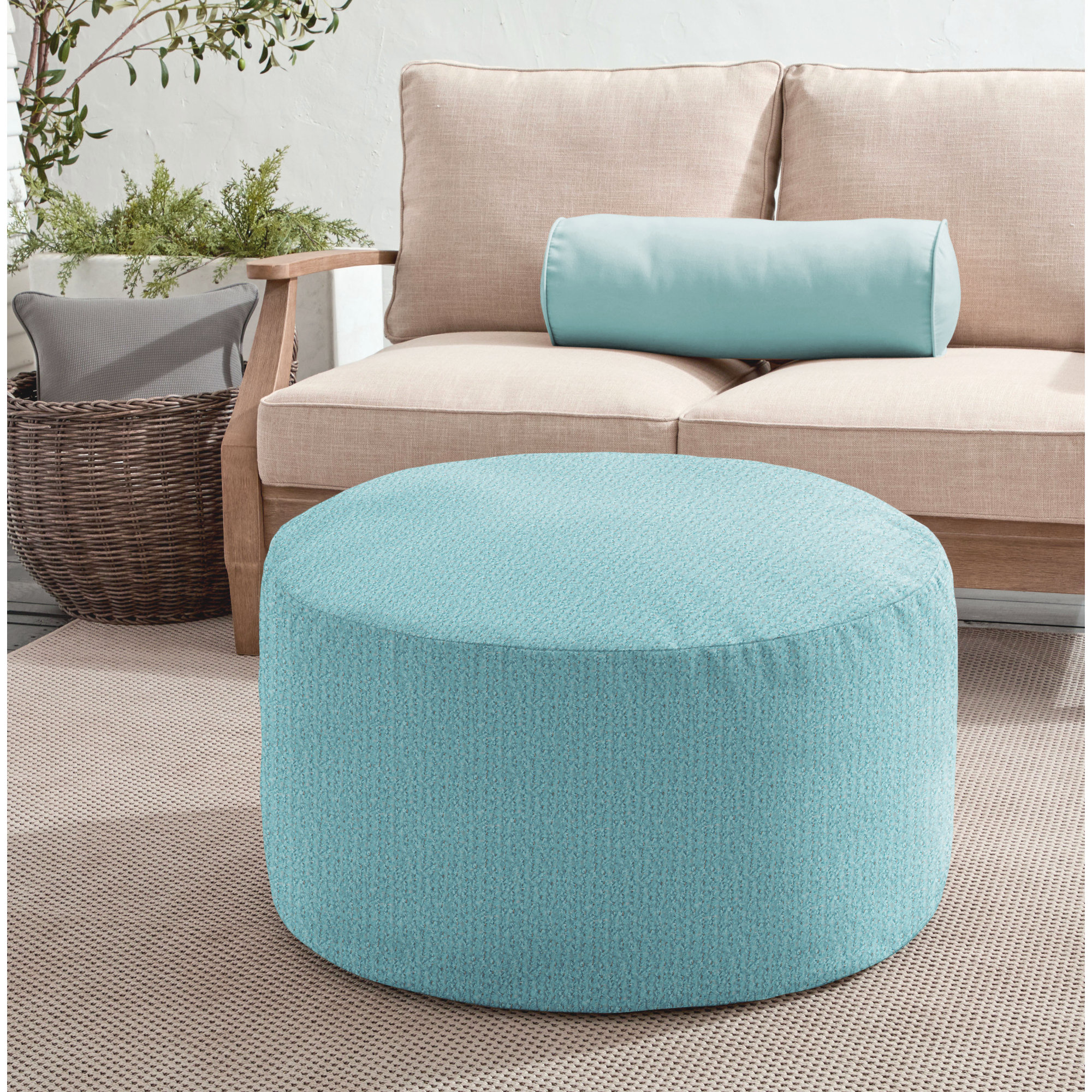 Continuous Round Upholstered Outdoor Ottoman with Sunbrella® Cushion, Light Blue