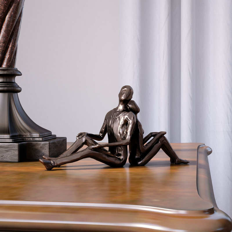 Sculpture Akyng, couple romantique assis en bronze