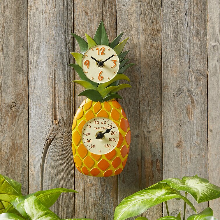 https://assets.wfcdn.com/im/01828602/resize-h755-w755%5Ecompr-r85/1412/141255870/Taylor+Precision+Products%2C+Pineapple+Poly+Resin+Clock+and+Thermometer%2C+12+Inch%2C+Multi-Color.jpg