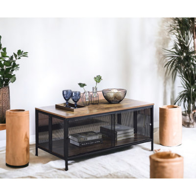 Table basse en chêne antique et noir avec compartiment de rangement en métal