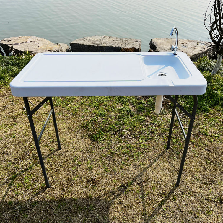 https://assets.wfcdn.com/im/01835386/resize-h755-w755%5Ecompr-r85/1978/197868536/Outdoor+Fish+And+Game+Cutting+Cleaning+Table+W%2FSink+And+Faucet.jpg