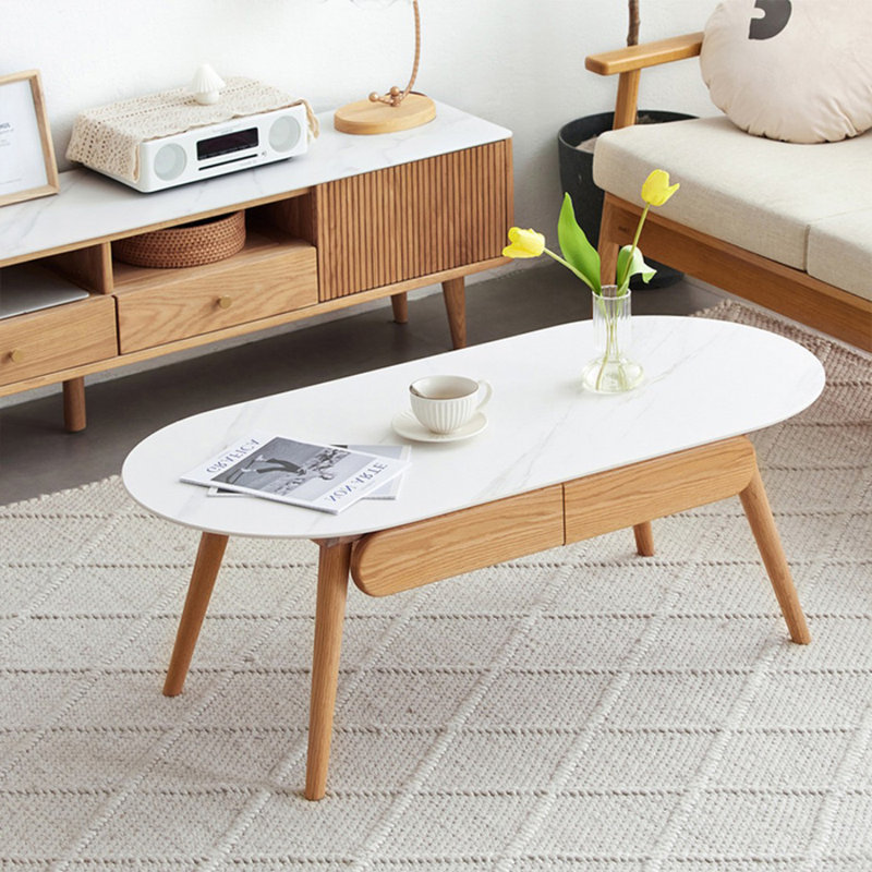 Pierre blanche et table basse ovale en bois massif