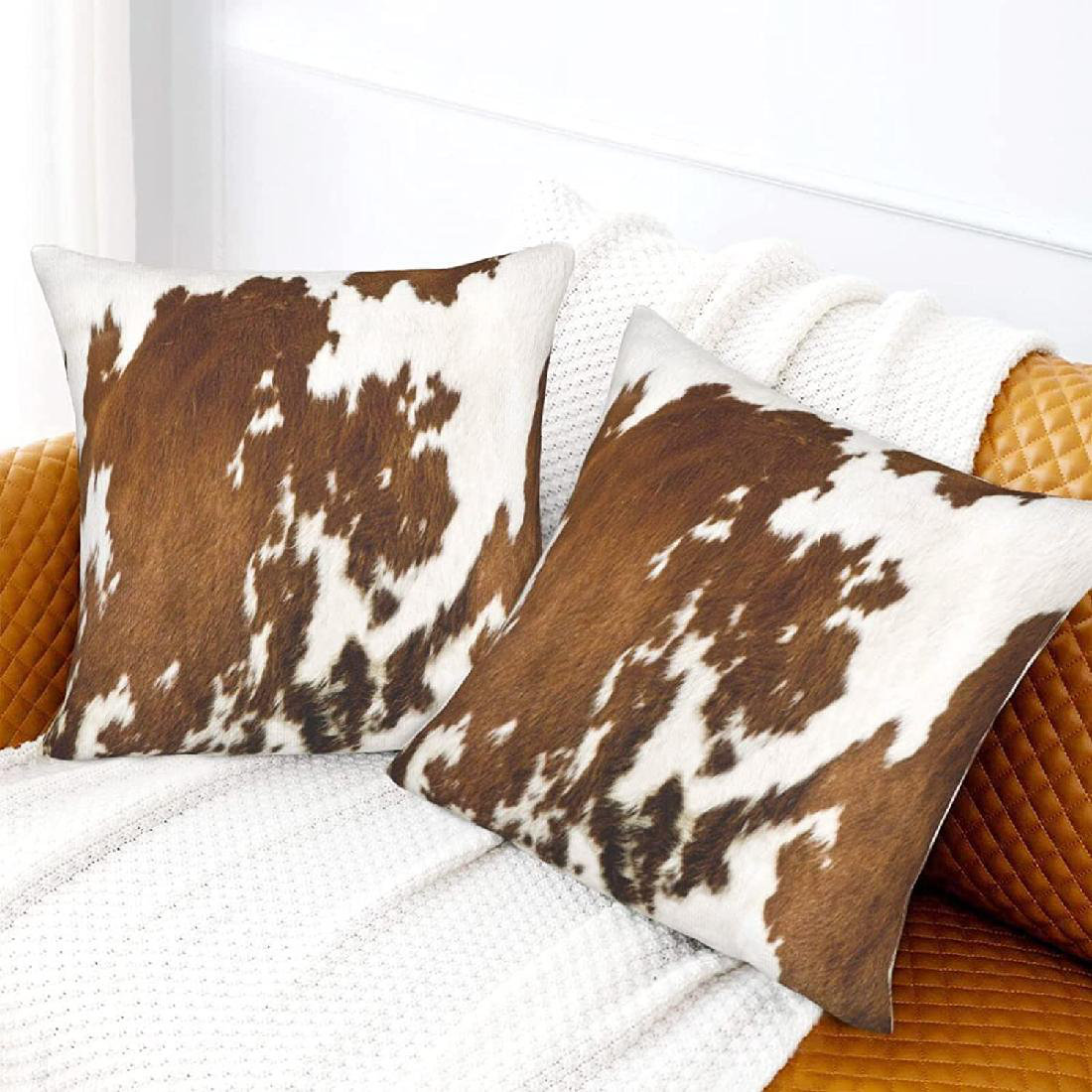 Faux cowhide throw discount pillows