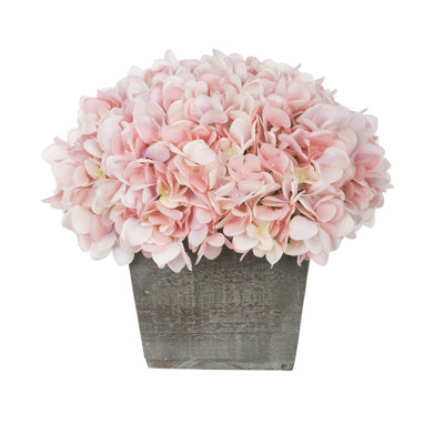 Arrangement d'hortensias artificiels roses en pot