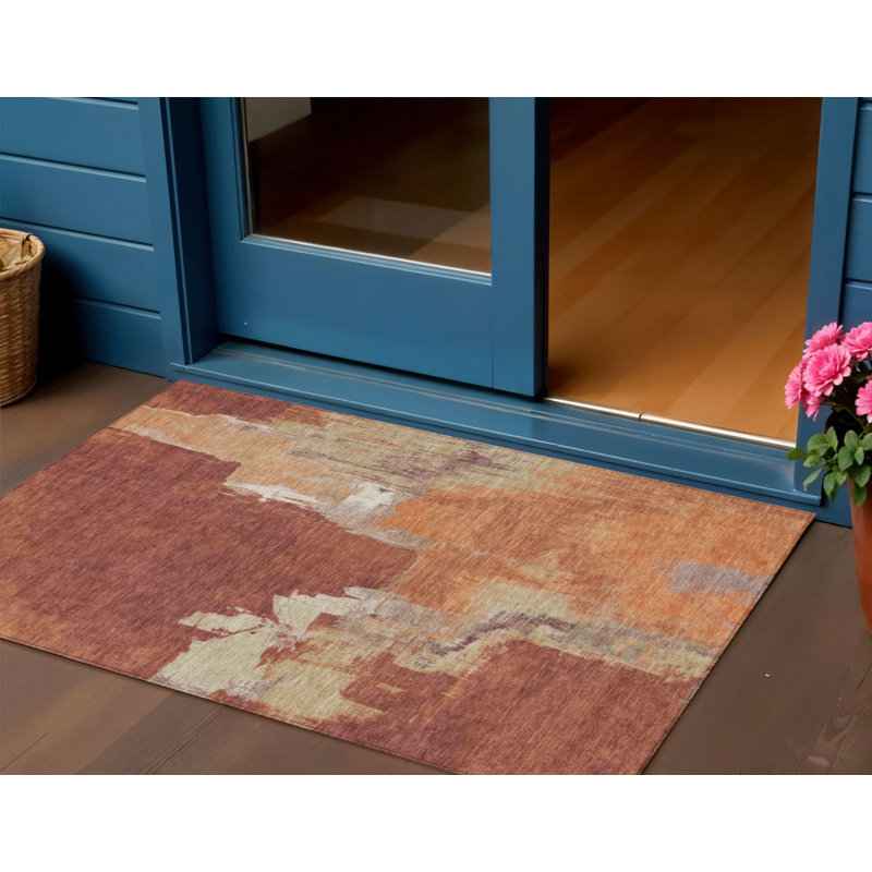 3' X 5' Orange And Burnt Orange Abstract Washable Indoor Outdoor Area Rug