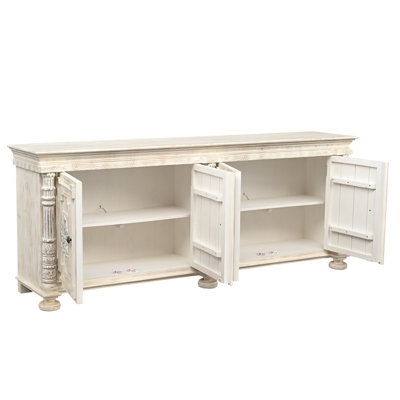 Buffet en bois massif sculpté 4 portes