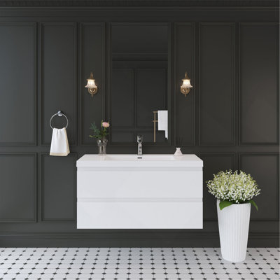 Meuble-lavabo flottant avec lavabo, mural et peu encombrant, idéal pour les salles de bain modernes.