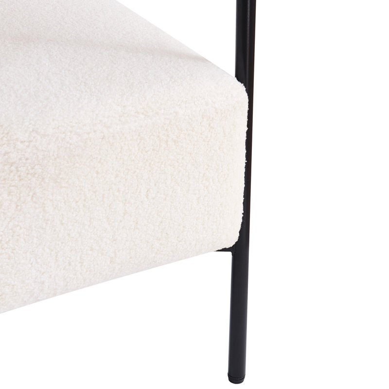 Élégant fauteuil blanc avec coussin en tissu Boucle et pieds en métal noir - Décoration intérieure incurvée dans un support