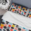 Ensemble de housse de couette à pois noir et orange-109145641