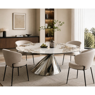 Table de salle à manger ovale moderne en pierre frittée avec dessus d'aspect marbre et pied central en acier inoxydable, idéale pour la cuisine et le salon.