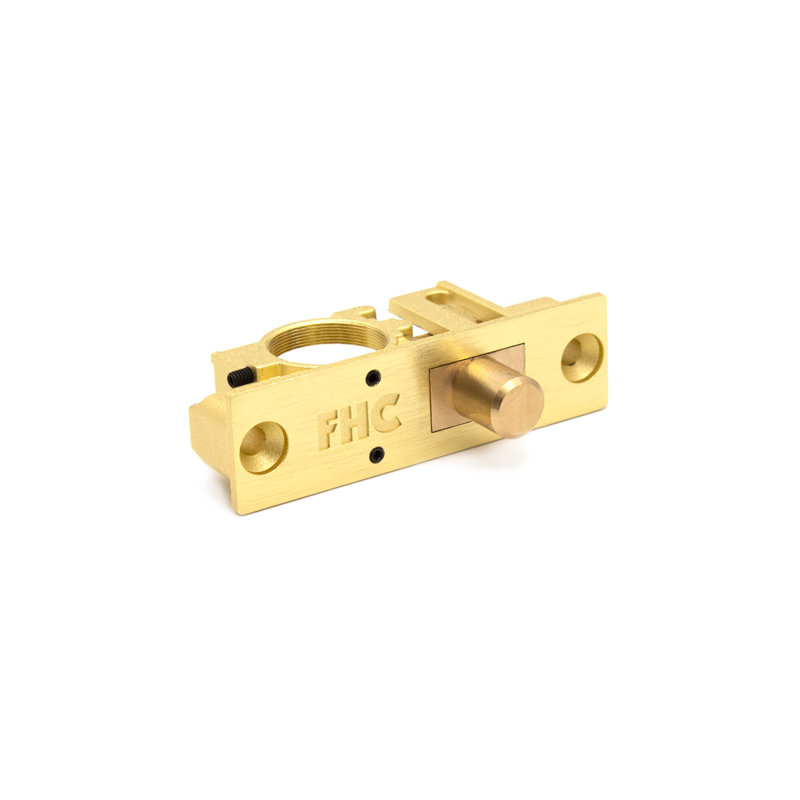 Verrou de sol discret FHC R777SLP pour rail de porte, avec vis de fixation, en laiton, diamètre des boulons : 5/8 po, finition laiton.