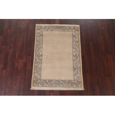 Tapis népalais beige en laine beige noué à la main 4 x 5