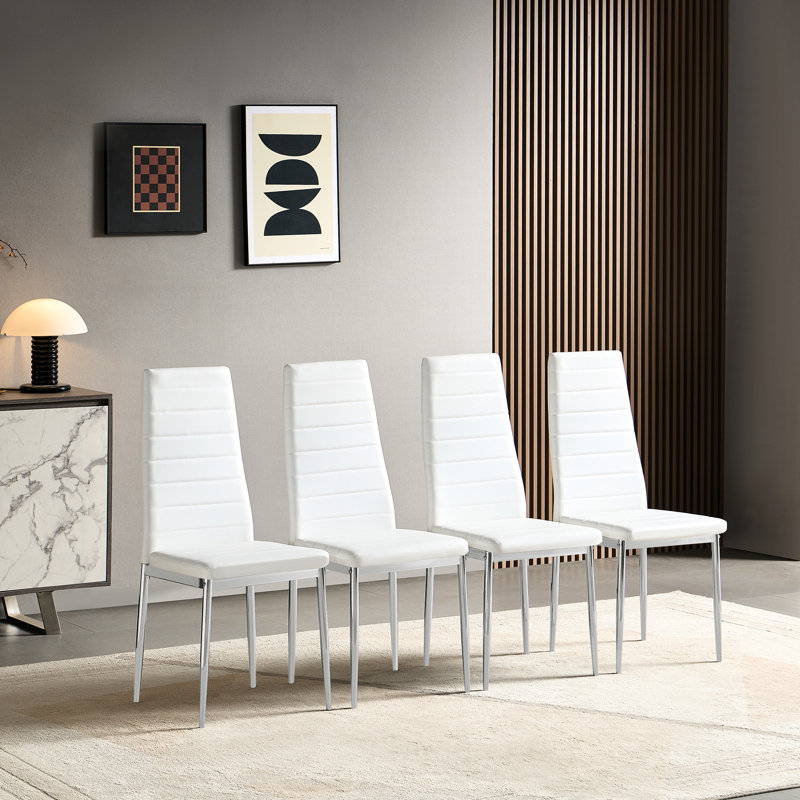 Chaise de salle à manger moderne 4 pièces en cuir synthétique doux et pieds argentés élégants, idéale pour les petites tables confortables