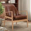 Fauteuil en cuir de style Mid-Century avec structure en bois et dossier haut
