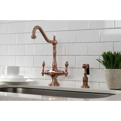 Kingston Brass Heritage Two-Handle Deck Mount Kitchen Faucet