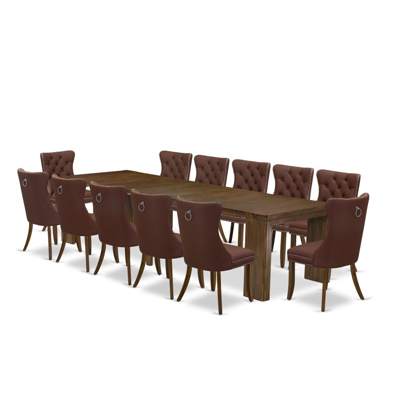 Cet ensemble de salle à manger extensible de 13 pièces comprend une table rectangulaire et 12 chaises de salle à manger en tissu de polyester bourgogne, noyer antique.