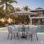 Ensemble repas pour 4 personnes en osier avec table ronde, coussins inclus