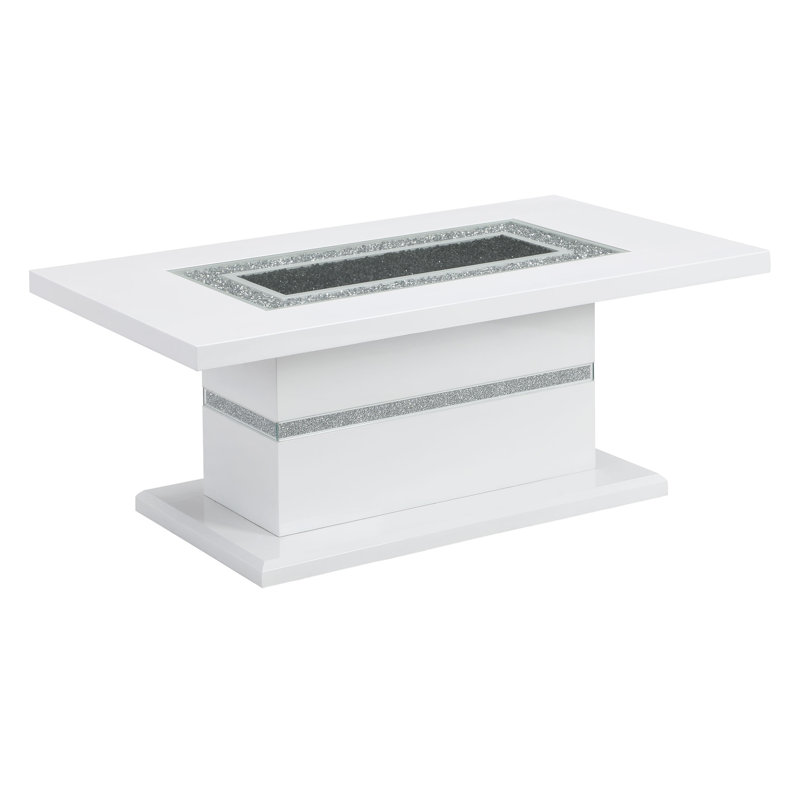 Table basse blanche avec structure solide et détails scintillants de style contemporain