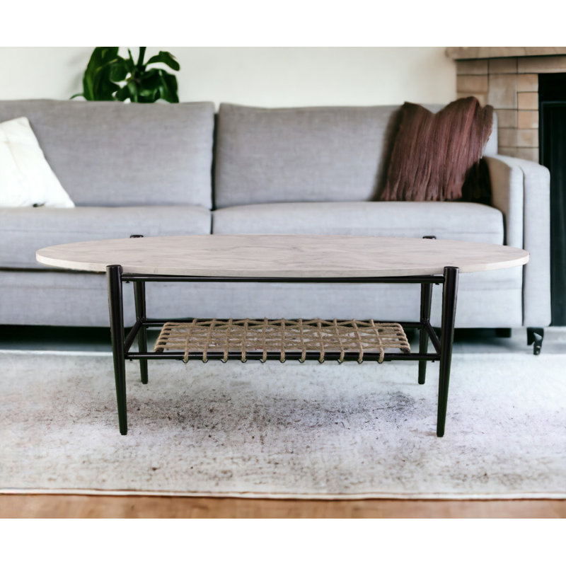 Table basse ovale en corde de métal et de faux marbre noir et blanc 52 po Sebouh
