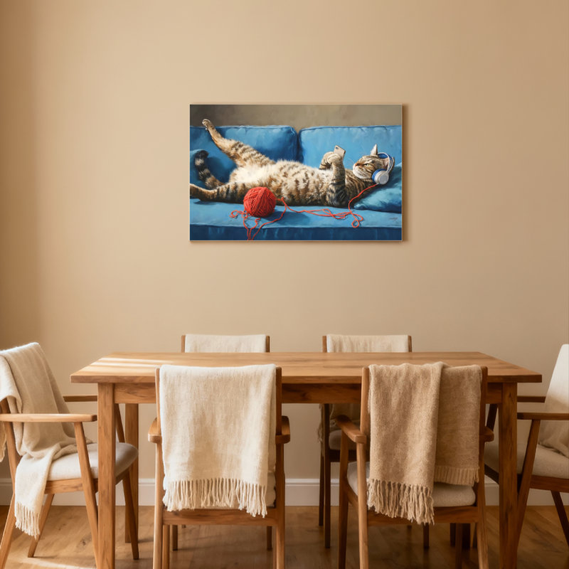 Ensemble de 1 tableau sur toile tendue représentant un chat avec un casque d'écoute et de la laine, H 12 po x l 18 po
