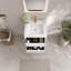Meuble-lavabo mural avec lavabo, armoire de rangement flottante avec comptoir en résine de pierre et tiroirs à fermeture en douceur-115688394
