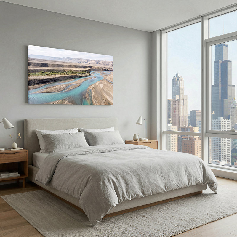 «Turquoise River Winding Through Arid Desert Valley», art mural, 32“W x 16”H