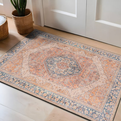 Tapis lavable à la machine à motif de médaillon rouille Valora avec envers antidérapant