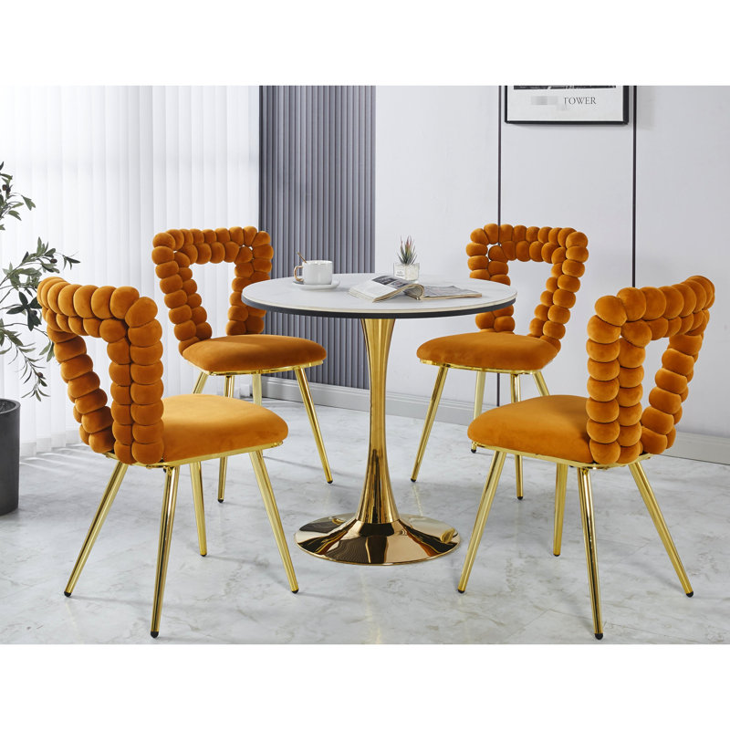 Chaises orange et dorées de 4 personnes: sièges confortables, structure en fer, convient à la salle à manger, au café au bureau