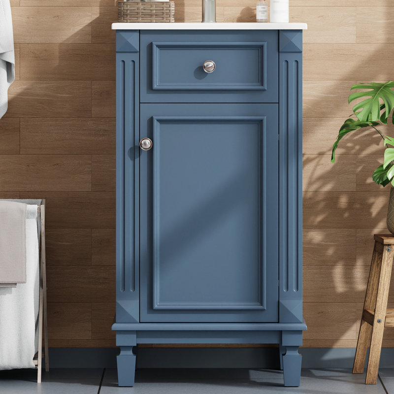 Meuble-lavabo bleu de style français avec lavabo en céramique, porte à fermeture douce et tablette réglable pour un rangement élégant