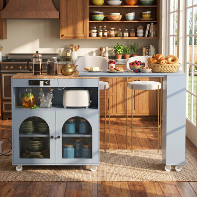 Îlot de cuisine roulant gris-bleu avec table allongée, lumières DEL, prises de courant et 2 portes en verre cannelé