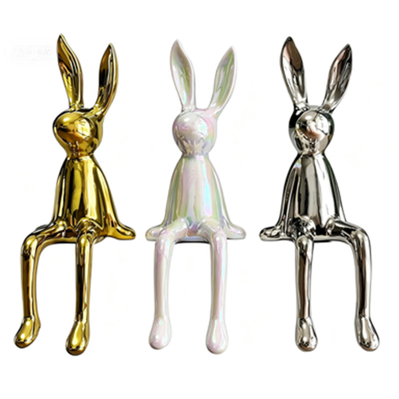 Three rabbit decorative sculptures