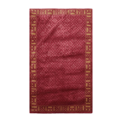 Tapis prune tissé à la main
