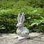 Statue de lapin en ciment patiné