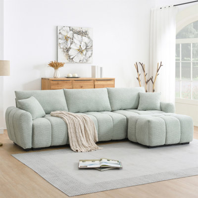 Canapé modulaire de 110 po en forme de L avec siège très grand, conception en ligne, repose-pieds mobile, mousse haute densité, combinaison libre, structure en métal et bois robuste, tissu bouclé, 3 couleurs