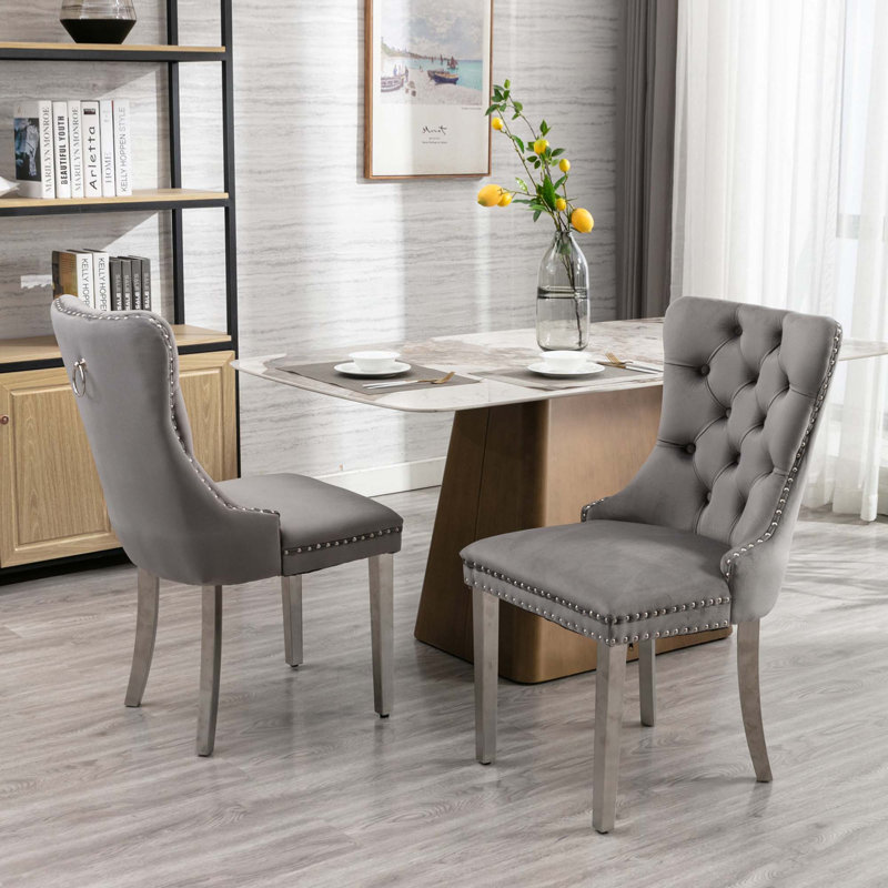 Chaise rembourrée capitonnée en velours de bois massif
