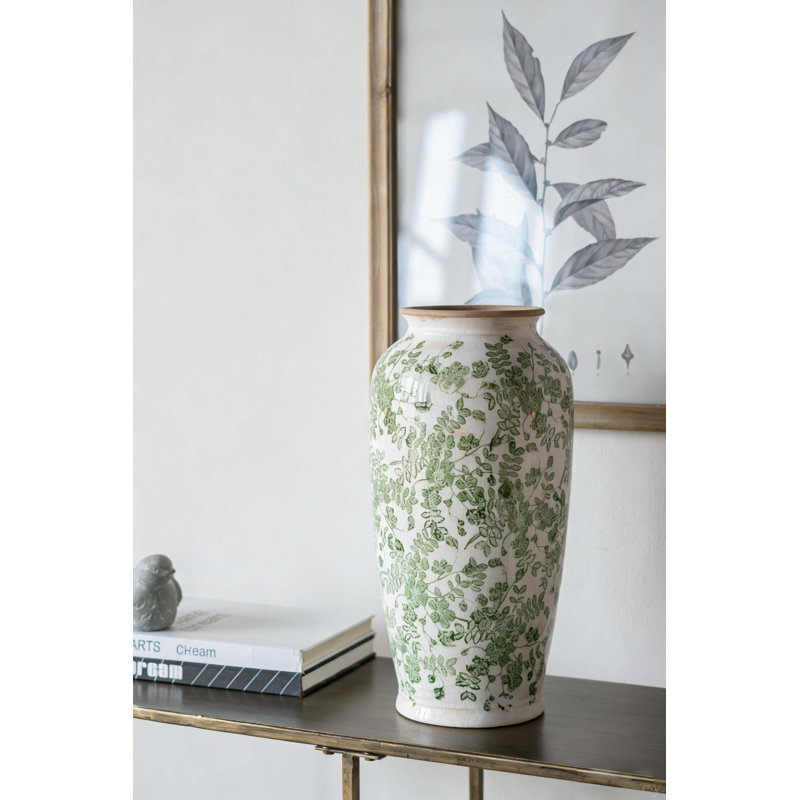 Vase à fleurs en céramique blanche avec motif floral vert