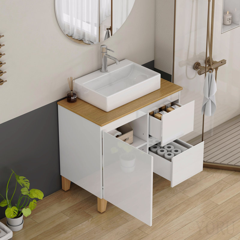 Meuble-lavabo moderne de 80 cm avec lavabo intégré, 1 porte et 2 grands tiroirs, système de fermeture amortie, design sans poignées, plateau et pieds en bois massif naturel, lavabo rond en céramique sur le comptoir, blanc lustré