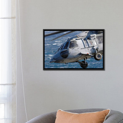" An MH-60S Seahawk Helicopter " by Stocktrek Images