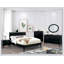 Commode 4 tiroirs Mid-Century moderne noire avec poignées encastrées et pieds ronds effilés, parfaite pour le rangement contemporain