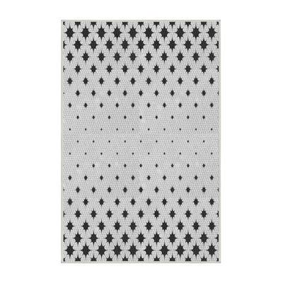 Tapis gris tissé à la machine