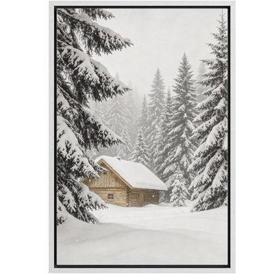 Chalet en bois rond chaleureux dans une forêt de conifères enneigée - Tableau encadré sur toile pour chambre principale