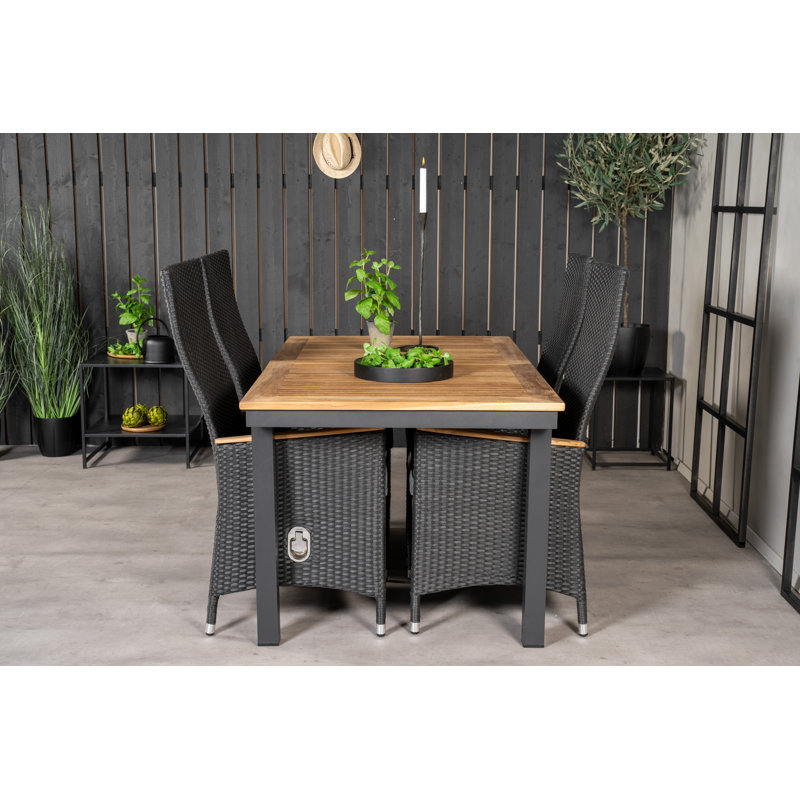 Navya 4 - Person Patio Dining Set with Extendable Rectangular Table , Cushions Included