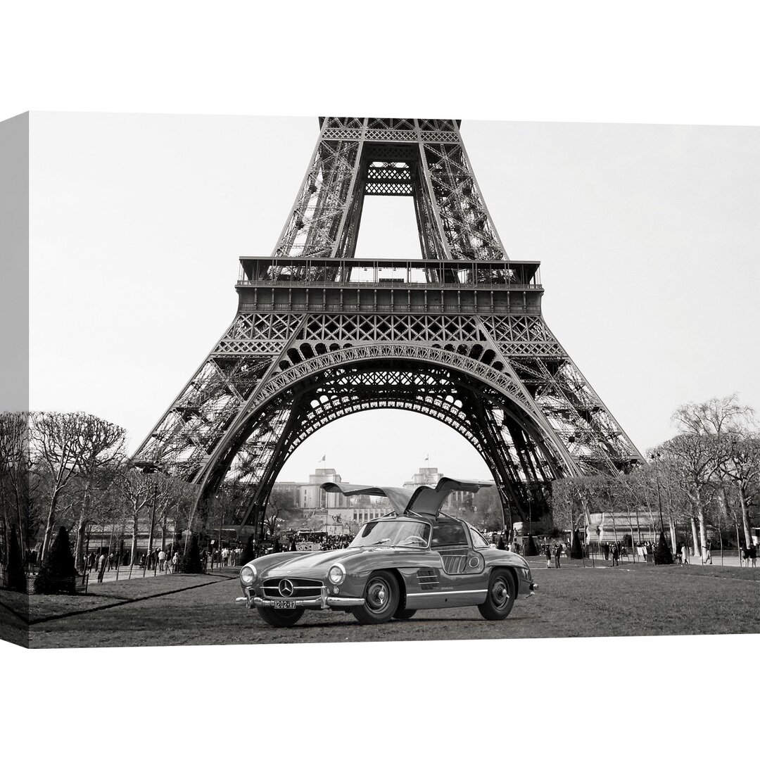 Leinwandbild Roadster Under the Eiffel Tower (BW) von Gasoline Images