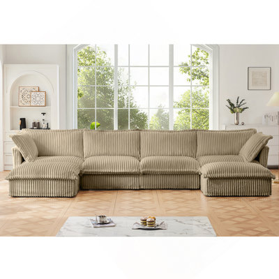 Canapé modulaire confortable en forme de U avec plusieurs coussins et configurations polyvalentes pour les espaces de vie