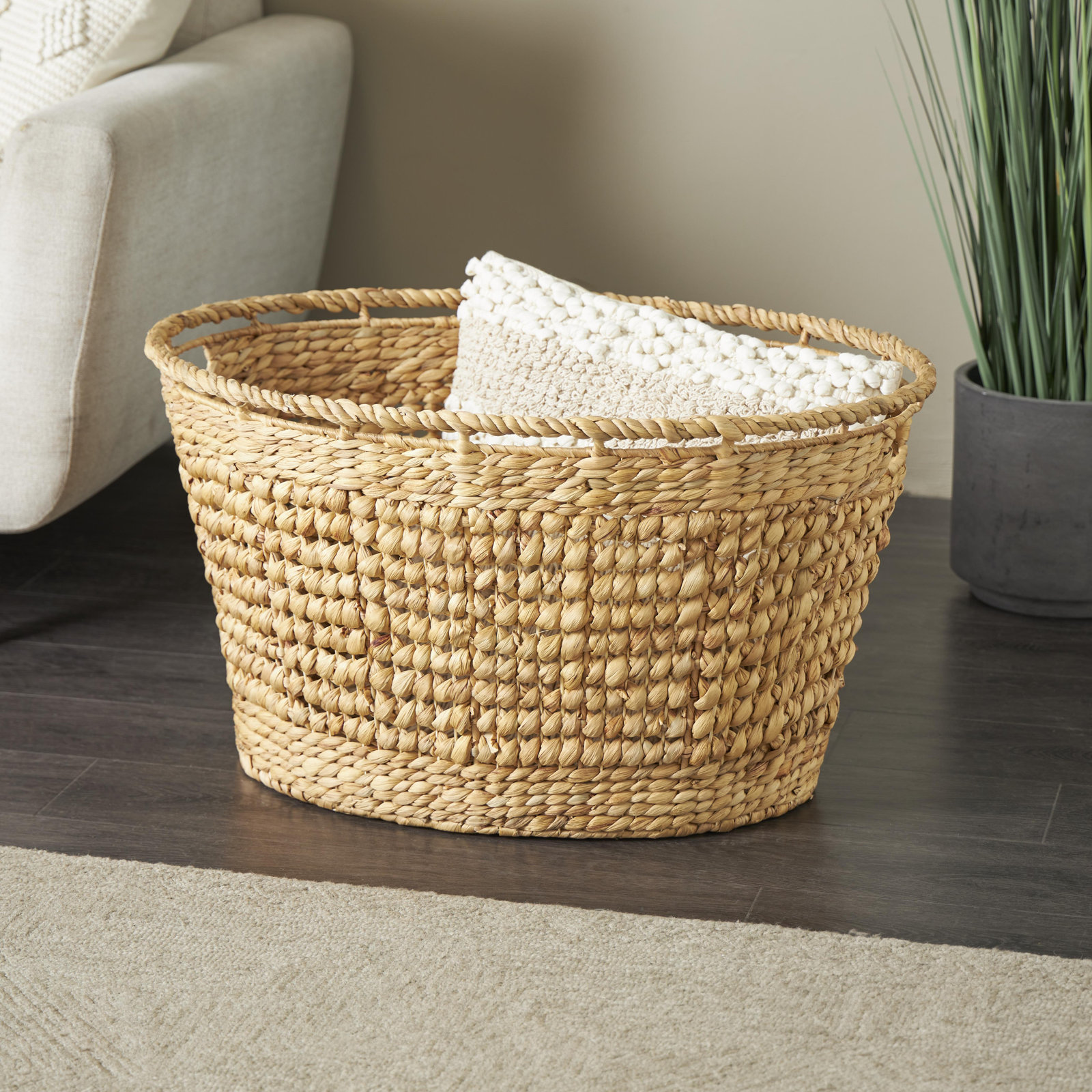 Seagrass Handmade Woven Oval Storage Basket With Elevated Rim And Slot Handles