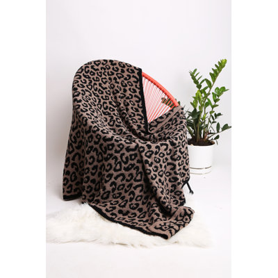 Jeté de luxe à motif léopard 