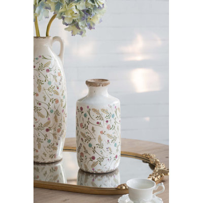 Vase cylindrique en céramique avec motifs floraux délicats pour rehausser les décorations