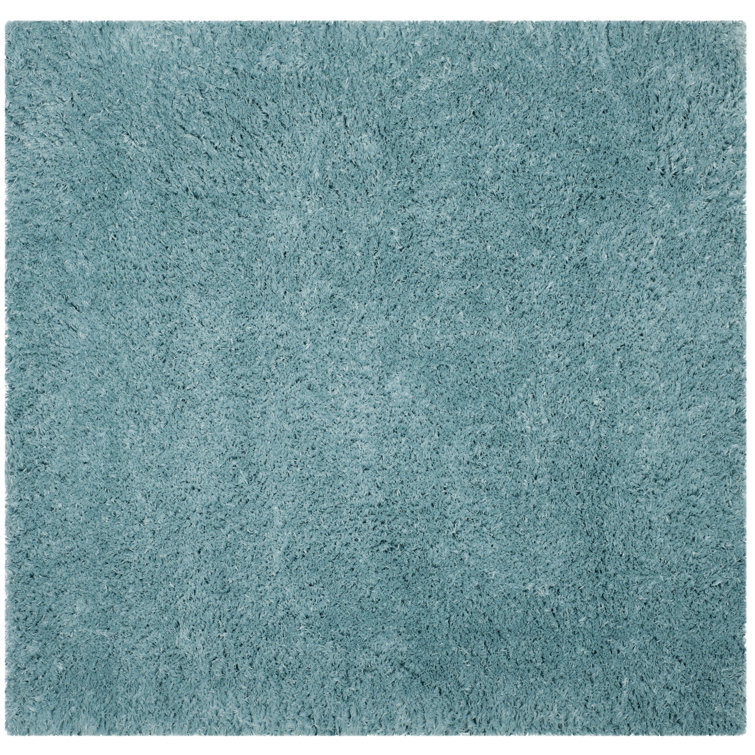 Hermina Light Turquoise Area Rug